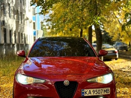 Красный Альфа Ромео Джулия, объемом двигателя 2.1 л и пробегом 200 тыс. км за 20000 $, фото 1 на Automoto.ua