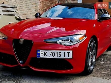 Красный Альфа Ромео Джулия, объемом двигателя 2 л и пробегом 99 тыс. км за 20000 $, фото 1 на Automoto.ua