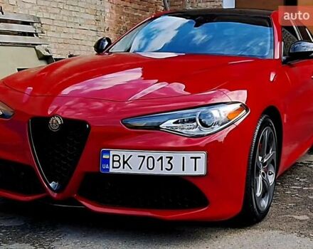 Красный Альфа Ромео Джулия, объемом двигателя 2 л и пробегом 99 тыс. км за 20000 $, фото 1 на Automoto.ua