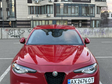Красный Альфа Ромео Джулия, объемом двигателя 2 л и пробегом 83 тыс. км за 18500 $, фото 1 на Automoto.ua