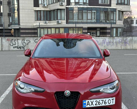Красный Альфа Ромео Джулия, объемом двигателя 2 л и пробегом 83 тыс. км за 18500 $, фото 1 на Automoto.ua