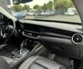 Білий Альфа Ромео Стелвіо, об'ємом двигуна 2 л та пробігом 34 тис. км за 10600 $, фото 9 на Automoto.ua