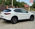 Білий Альфа Ромео Стелвіо, об'ємом двигуна 2 л та пробігом 82 тис. км за 18500 $, фото 11 на Automoto.ua