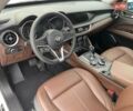 Білий Альфа Ромео Стелвіо, об'ємом двигуна 2 л та пробігом 99 тис. км за 21000 $, фото 10 на Automoto.ua
