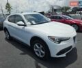 Білий Альфа Ромео Стелвіо, об'ємом двигуна 2 л та пробігом 77 тис. км за 15000 $, фото 2 на Automoto.ua
