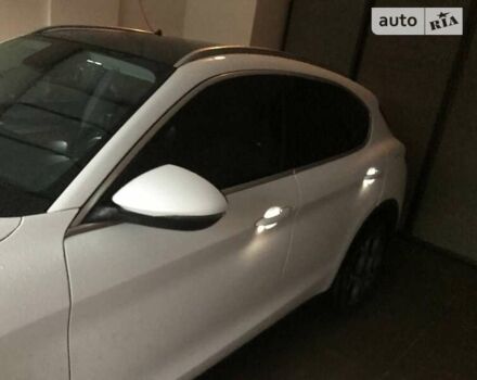 Белый Альфа Ромео Стелвио, объемом двигателя 2 л и пробегом 92 тыс. км за 23500 $, фото 2 на Automoto.ua