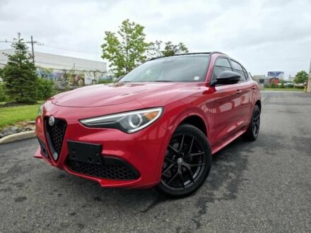 Красный Альфа stelvio, объемом двигателя 2 л и пробегом 52 тыс. км за 31900 $, фото 1 на Automoto.ua