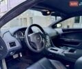 Серый Астон Мартин ДБ9, объемом двигателя 6 л и пробегом 40 тыс. км за 75000 $, фото 52 на Automoto.ua