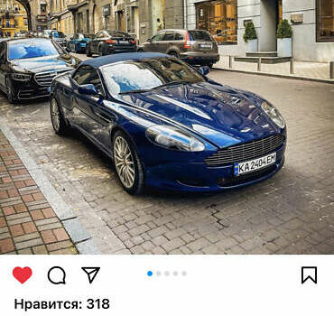 Синий Астон Мартин ДБ9, объемом двигателя 6 л и пробегом 64 тыс. км за 58000 $, фото 6 на Automoto.ua