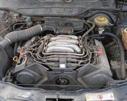 Черный Ауди 100, объемом двигателя 2.5 л и пробегом 300 тыс. км за 500 $, фото 1 на Automoto.ua