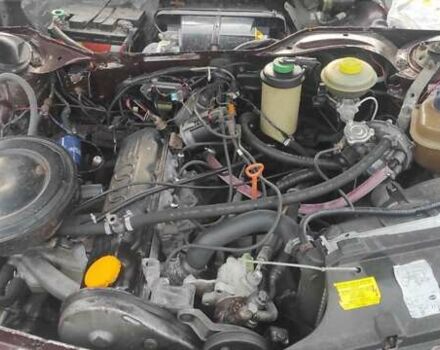 Красный Ауди 100, объемом двигателя 2 л и пробегом 280 тыс. км за 1500 $, фото 1 на Automoto.ua