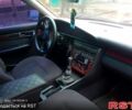 Красный Ауди 100, объемом двигателя 2.6 л и пробегом 300 тыс. км за 4000 $, фото 1 на Automoto.ua