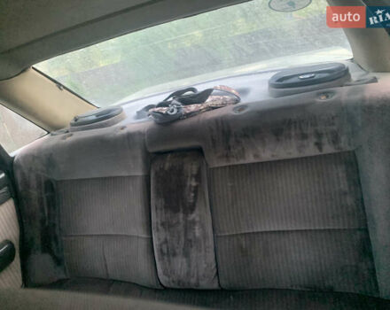 Сірий Ауді 100, об'ємом двигуна 2 л та пробігом 285 тис. км за 1500 $, фото 1 на Automoto.ua