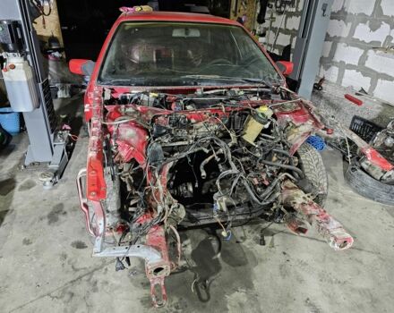 Красный Ауди 200, объемом двигателя 2.2 л и пробегом 300 тыс. км за 3400 $, фото 1 на Automoto.ua