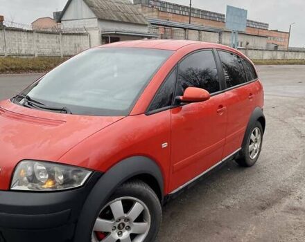 Красный Ауди А2, объемом двигателя 1.4 л и пробегом 238 тыс. км за 4000 $, фото 1 на Automoto.ua