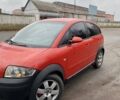 Красный Ауди А2, объемом двигателя 1.4 л и пробегом 238 тыс. км за 4000 $, фото 1 на Automoto.ua
