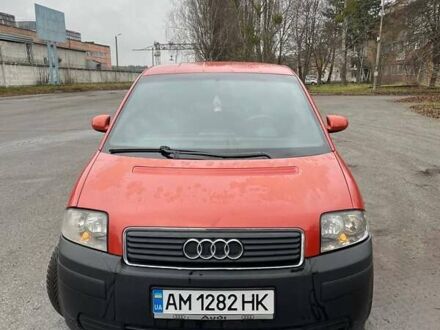 Красный Ауди А2, объемом двигателя 1.4 л и пробегом 238 тыс. км за 4000 $, фото 1 на Automoto.ua