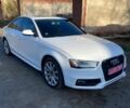 Білий Ауді А4, об'ємом двигуна 2 л та пробігом 252 тис. км за 10041 $, фото 1 на Automoto.ua