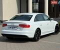 Білий Ауді А4, об'ємом двигуна 2 л та пробігом 229 тис. км за 10999 $, фото 2 на Automoto.ua