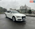 Білий Ауді А4, об'ємом двигуна 2 л та пробігом 202 тис. км за 12999 $, фото 1 на Automoto.ua
