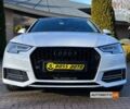 Белый Ауди А4, объемом двигателя 2 л и пробегом 170 тыс. км за 18250 $, фото 1 на Automoto.ua