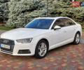 Белый Ауди А4, объемом двигателя 1.98 л и пробегом 144 тыс. км за 17399 $, фото 1 на Automoto.ua