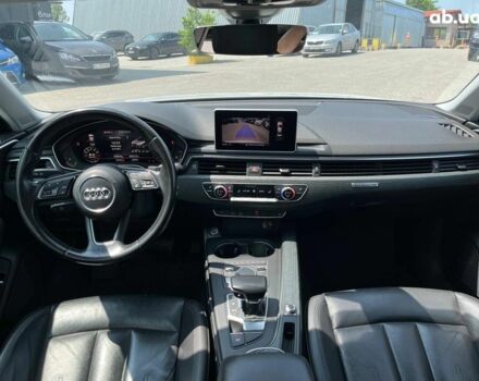 Білий Ауді А4, об'ємом двигуна 2 л та пробігом 169 тис. км за 18790 $, фото 19 на Automoto.ua