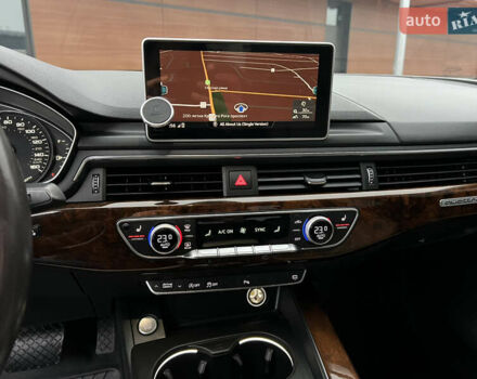 Білий Ауді А4, об'ємом двигуна 2 л та пробігом 84 тис. км за 20000 $, фото 45 на Automoto.ua