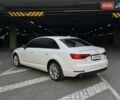 Білий Ауді А4, об'ємом двигуна 1.98 л та пробігом 150 тис. км за 17490 $, фото 4 на Automoto.ua
