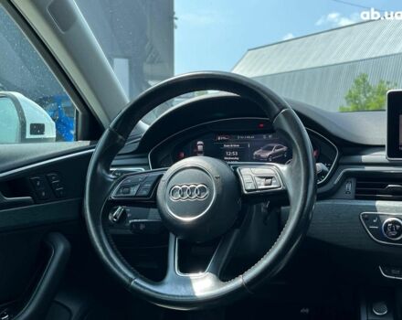 Білий Ауді А4, об'ємом двигуна 2 л та пробігом 169 тис. км за 18790 $, фото 14 на Automoto.ua