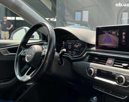 Білий Ауді А4, об'ємом двигуна 2 л та пробігом 169 тис. км за 18790 $, фото 41 на Automoto.ua