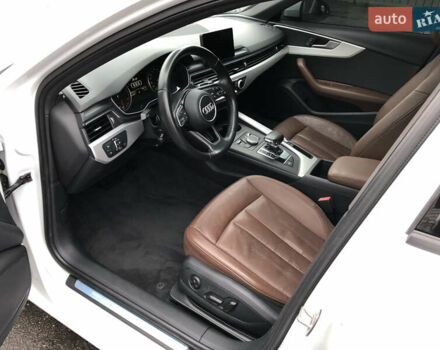 Білий Ауді А4, об'ємом двигуна 2 л та пробігом 173 тис. км за 12345 $, фото 32 на Automoto.ua