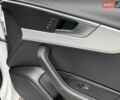 Білий Ауді А4, об'ємом двигуна 2 л та пробігом 179 тис. км за 13800 $, фото 32 на Automoto.ua