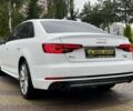 Білий Ауді А4, об'ємом двигуна 2 л та пробігом 134 тис. км за 16000 $, фото 4 на Automoto.ua