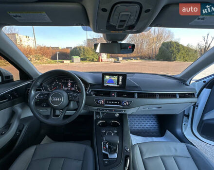 Белый Ауди А4, объемом двигателя 2 л и пробегом 122 тыс. км за 18650 $, фото 90 на Automoto.ua