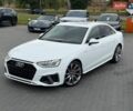 Білий Ауді А4, об'ємом двигуна 2 л та пробігом 64 тис. км за 28000 $, фото 1 на Automoto.ua