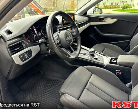 Білий Ауді А4, об'ємом двигуна 2 л та пробігом 227 тис. км за 16333 $, фото 8 на Automoto.ua