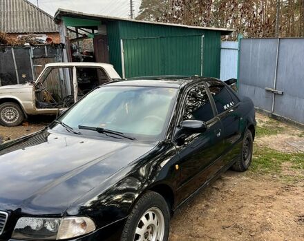 Черный Ауди А4, объемом двигателя 1.8 л и пробегом 402 тыс. км за 3800 $, фото 1 на Automoto.ua