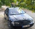 Черный Ауди А4, объемом двигателя 1.6 л и пробегом 250 тыс. км за 2100 $, фото 1 на Automoto.ua