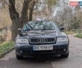 Черный Ауди А4, объемом двигателя 1.6 л и пробегом 318 тыс. км за 4000 $, фото 1 на Automoto.ua