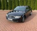 Черный Ауди А4, объемом двигателя 2.5 л и пробегом 305 тыс. км за 4700 $, фото 1 на Automoto.ua
