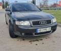Черный Ауди А4, объемом двигателя 2 л и пробегом 305 тыс. км за 4950 $, фото 1 на Automoto.ua