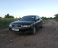 Чорний Ауді А4, об'ємом двигуна 2 л та пробігом 260 тис. км за 4185 $, фото 1 на Automoto.ua