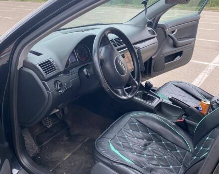 Черный Ауди А4, объемом двигателя 2 л и пробегом 365 тыс. км за 5600 $, фото 4 на Automoto.ua