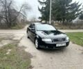 Чорний Ауді А4, об'ємом двигуна 1.8 л та пробігом 306 тис. км за 2400 $, фото 1 на Automoto.ua