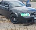 Черный Ауди А4, объемом двигателя 2.5 л и пробегом 307 тыс. км за 6100 $, фото 1 на Automoto.ua