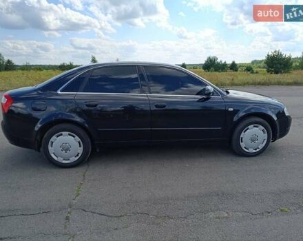Черный Ауди А4, объемом двигателя 1.98 л и пробегом 306 тыс. км за 4300 $, фото 2 на Automoto.ua