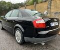 Черный Ауди А4, объемом двигателя 2 л и пробегом 270 тыс. км за 3500 $, фото 1 на Automoto.ua