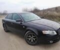 Черный Ауди А4, объемом двигателя 2 л и пробегом 220 тыс. км за 4200 $, фото 1 на Automoto.ua