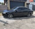 Черный Ауди А4, объемом двигателя 2 л и пробегом 394 тыс. км за 5700 $, фото 1 на Automoto.ua